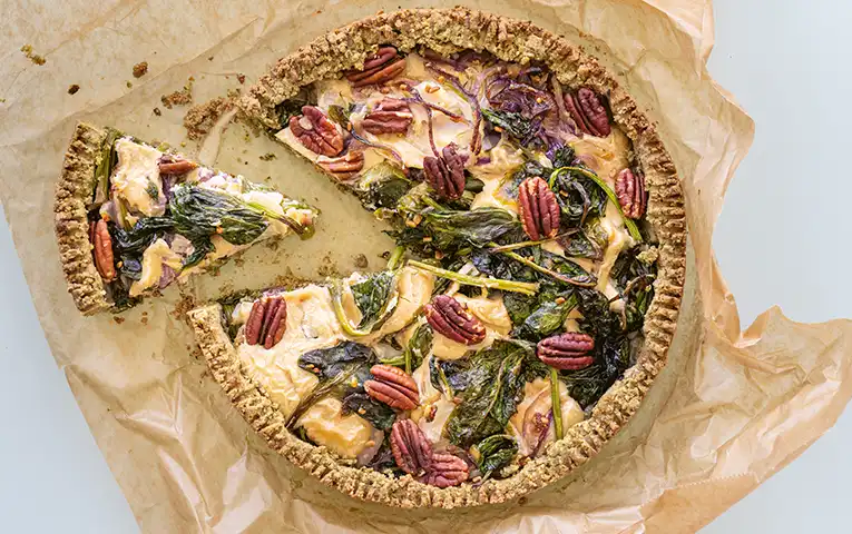Nuts spring quiche that looks like pizza